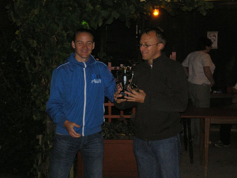 P8200374.JPG -  Pete Fox takes the Player's Player trophies. 